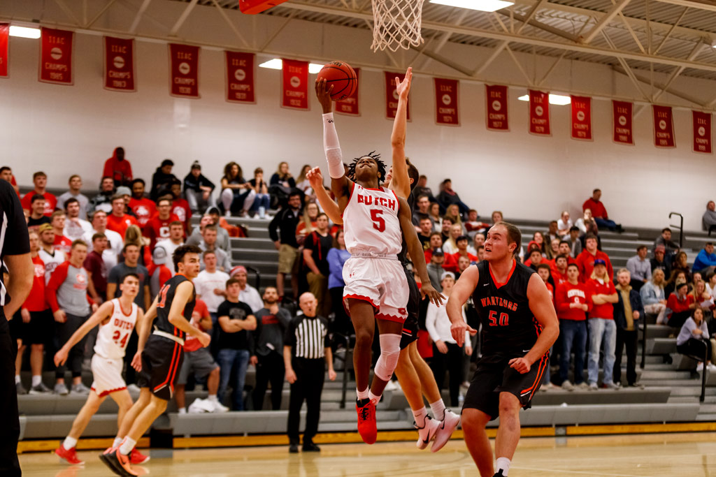 Action shot from a basketball game in the newly-renovated P.H. Kuyper Gymnasium.